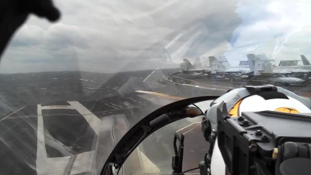 POV fighter jet takeoff, F/A-18 takeoff from aircraft carrier, with natural audio.