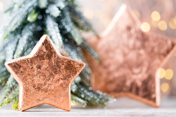 Christmas bronze decoration. Holiday decorations bronze on bokeh