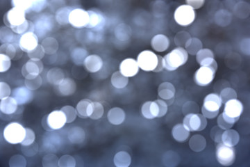 Naklejka premium White bokeh lights in blur background