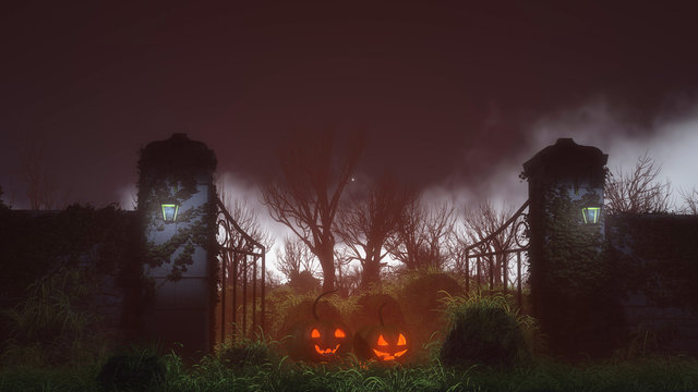 Two halloween pumpkins at spooky gate on misty night.