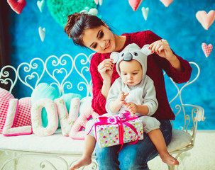 great mother holds her little  son