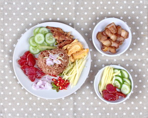 Thai food ,Fried jasmine rice with shrimp paste,(Kao Klok Kapi in Thai) and side dish. 