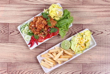 Spicy fried chicken salad (Yum Kai Zap in Thai) 