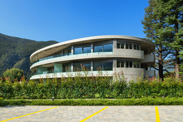 Luxurious building exterior. 
Architect Davide Macullo. Exterior modern luxury condo.
