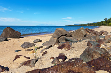 Lake Baikal. Sandy beach with black stones on the east coast
