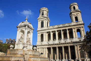 Fototapeta na wymiar Eglise et fontaine Saint-Sulpice à Paris, France
