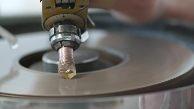 Closeup shot of polishing diamond with faceting machine