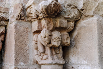sight of the capitals of the Romanesque church of Santa Maria the Real one in the Cillamayor town in Palencia, Castile and León, Spain