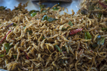 Small fish fritters. Sales at Sam Chuk market hundreds of years. Suphnburi, Thalland