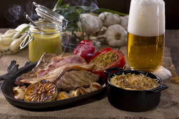 Dish with rustic snacks on rough canvas