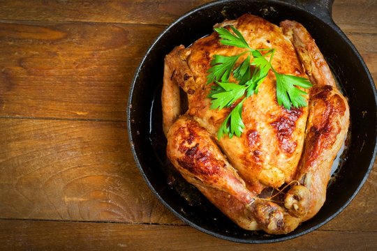 baked chicken,Style rustic.Selective focus.Top view, space for text.