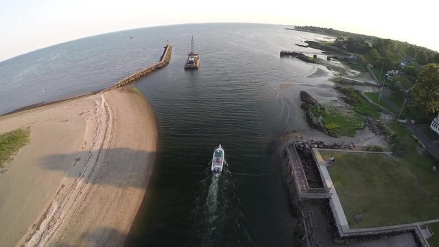 Boating aerials, a boat heads south west of out of Southport Harbor into Long Island Sound, Southport, Connecticut.