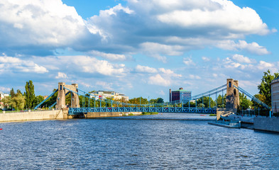 Obraz premium Grunwaldzki suspension bridge over river Odra in Wroclaw, Poland