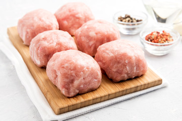 Forcemeat balls on wooden board