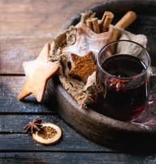 Hot red mulled wine with cookies 