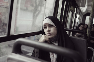 Fototapeta na wymiar Beautiful Iranian Muslim woman on the street