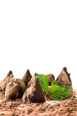 Homemade chocolate truffles isolated on white background

