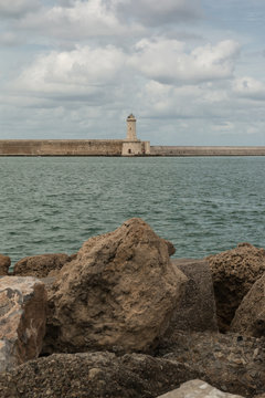 Tuscany Coastline: White Lighthouse Tower, Cliffs and Stone Jett
