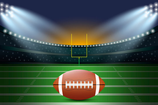 American football on field of stadium with spotlight.