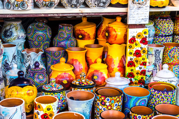 Fototapeta na wymiar Colorful ceramic pottery on display to be sold