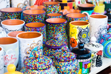 Colorful ceramic pottery on display to be sold