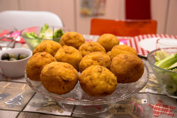 dish Sicilian arancini stuffed with meat and mozzarella