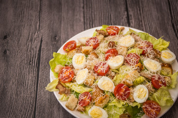 Healthy Grilled Chicken Caesar Salad with Cheese and Croutons