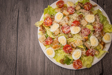 Healthy Grilled Chicken Caesar Salad with Cheese and Croutons