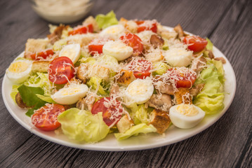 Healthy Grilled Chicken Caesar Salad with Cheese and Croutons