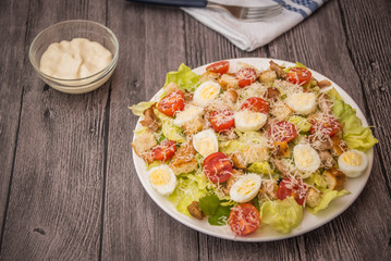 Healthy Grilled Chicken Caesar Salad with Cheese and Croutons