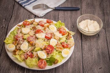 Healthy Grilled Chicken Caesar Salad with Cheese and Croutons