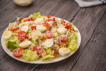 Healthy Grilled Chicken Caesar Salad with Cheese and Croutons