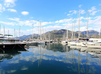 Fototapeta premium Yachts and its reflection in sea water