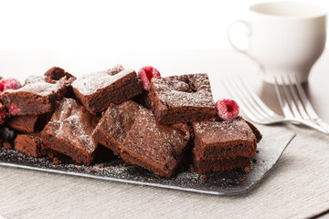 Cake chocolate brownies with raspberries