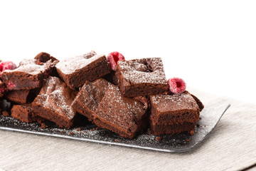 Cake chocolate brownies with raspberries