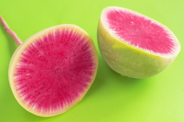 Radish. Two halves of radish with a pink pith.