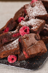 Cake chocolate brownies with raspberries