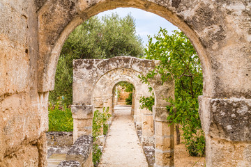 Fototapeta na wymiar gallery of arches in Italian garden