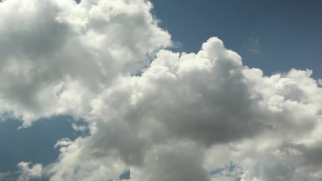 blue sky clouds timelapse time lapse big white clouds cumulus growing cloud formation sunny weather background