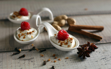 Christmas dessert: Sweet dessert with raspberry creme and christmas spice anise cinnamon