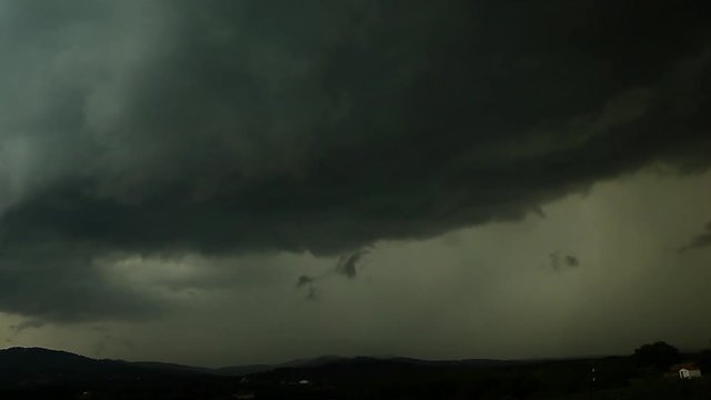 Supercell Storm Time Lapse with Lightning big dark stormy clouds with rain