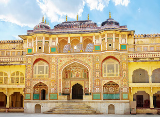 Naklejka na ściany i meble Detail of decorated gateway. Amber fort. Jaipur, India