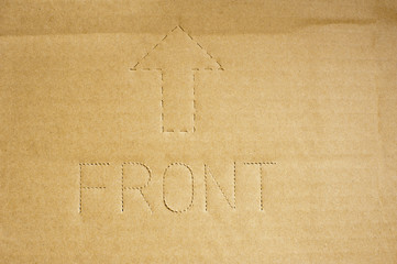 Top front stamped on a cardboard carton
