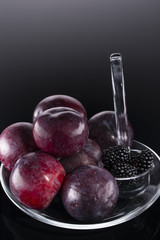 Fresh fruits on a transparent plate