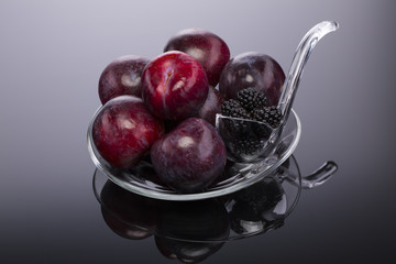 Fresh fruits on a transparent plate