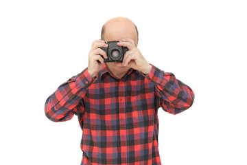 elderly man looks into the camera 