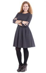 Smiling woman in dress and shoes on a high platform, isolated on white background