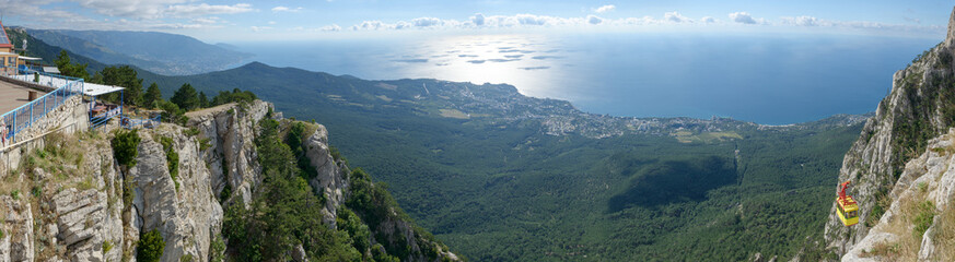 Obraz premium Panoramic view from Ai-Petri mountain towards coastline of Crime