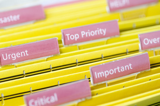 Business files labeled to prioritize urgency