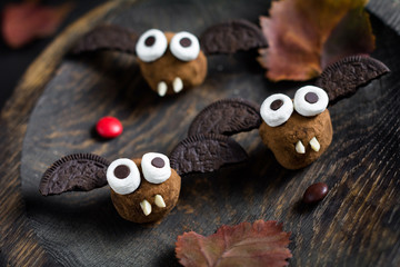 Chocolate sweet treats in shape of bats for Halloween party